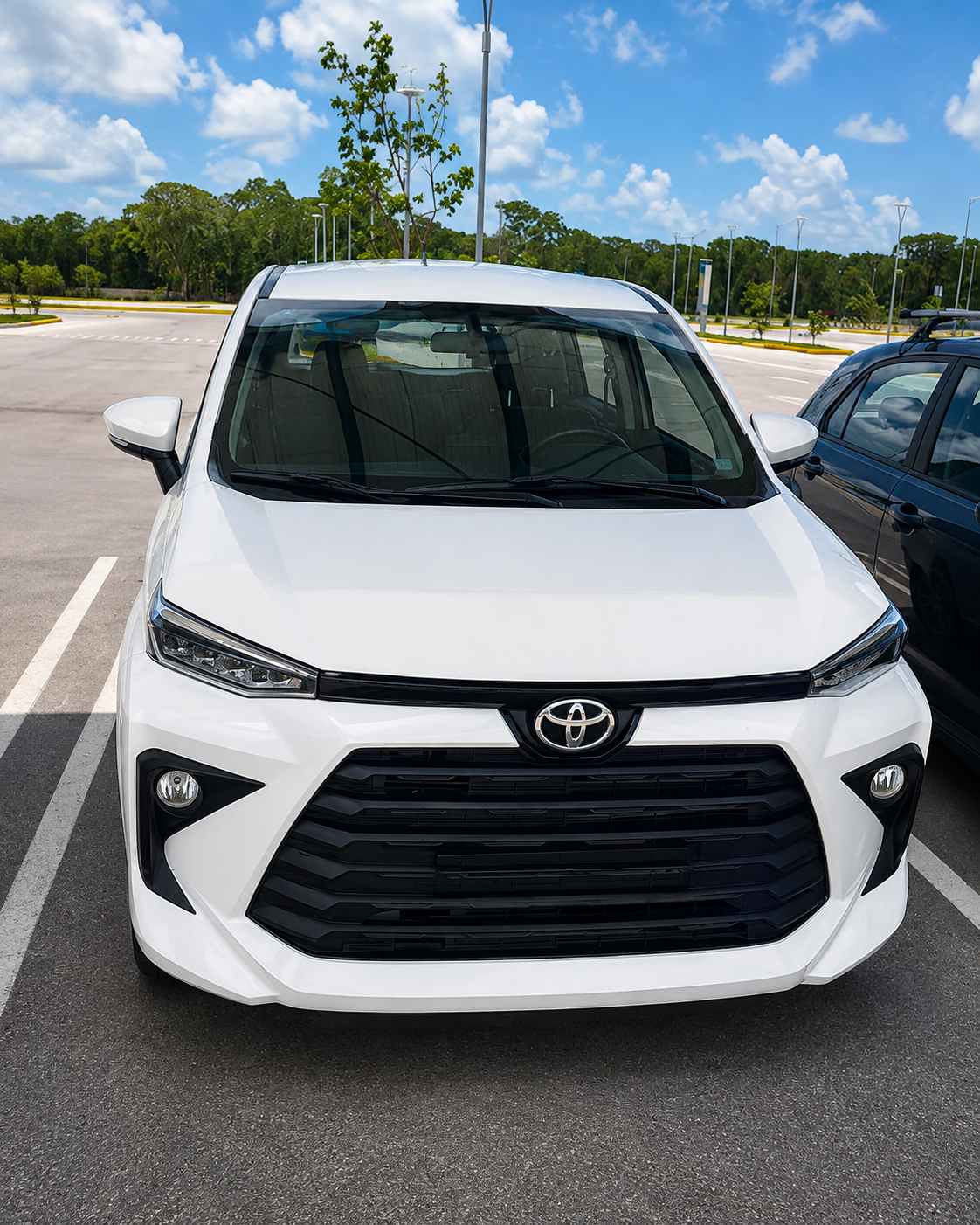 Automóvil Toyota blanco para servicio de turismo